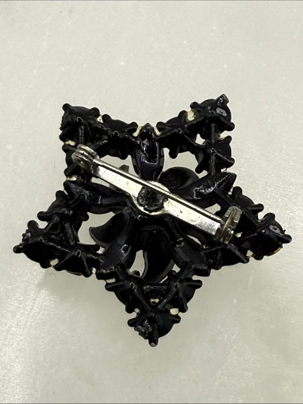 Vintage Starburst  Star rhinestone Pin Brooch - Black Metal unusual piece